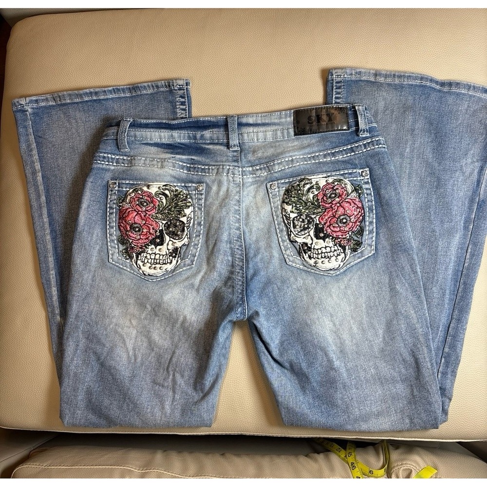 Womens size 13/14 SKY Flare Jeans Blue Denim skull bling embellished pants EUC.